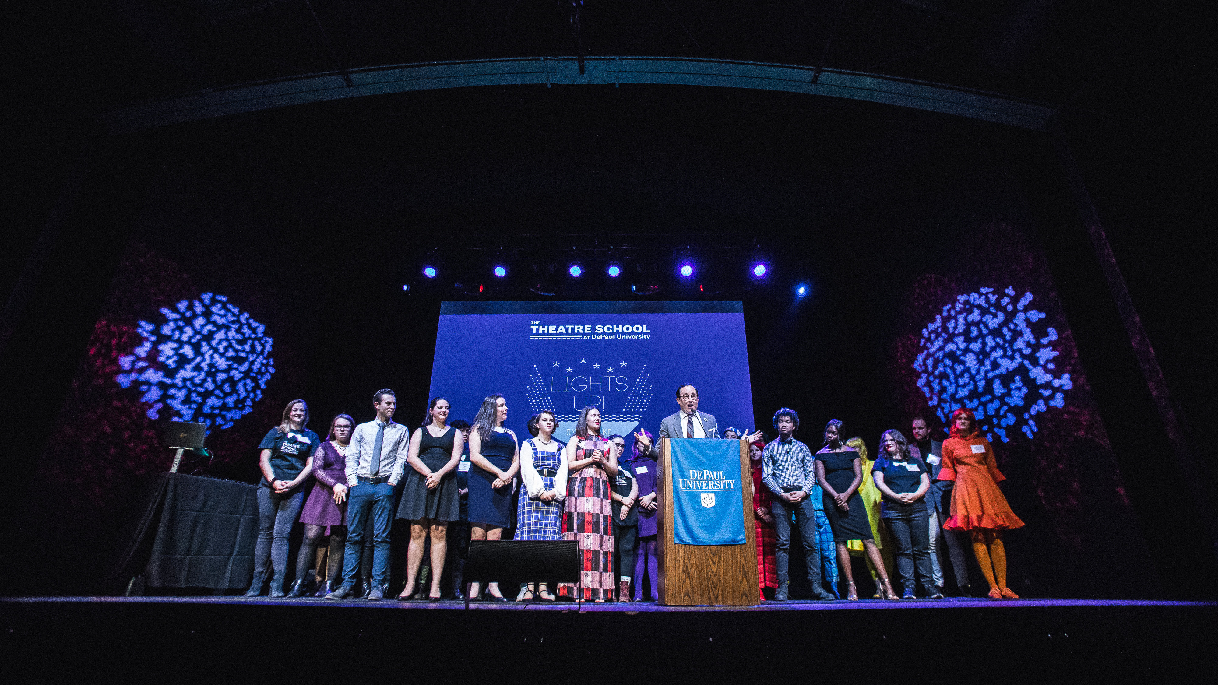 Current Theatre School students join MFA Acting alumnus P.J. Byrne on stage during the live auction.
