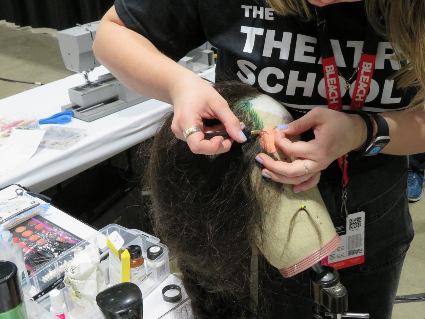 A student builds a wig in The Theatre School's Wig and Makeup Shop.