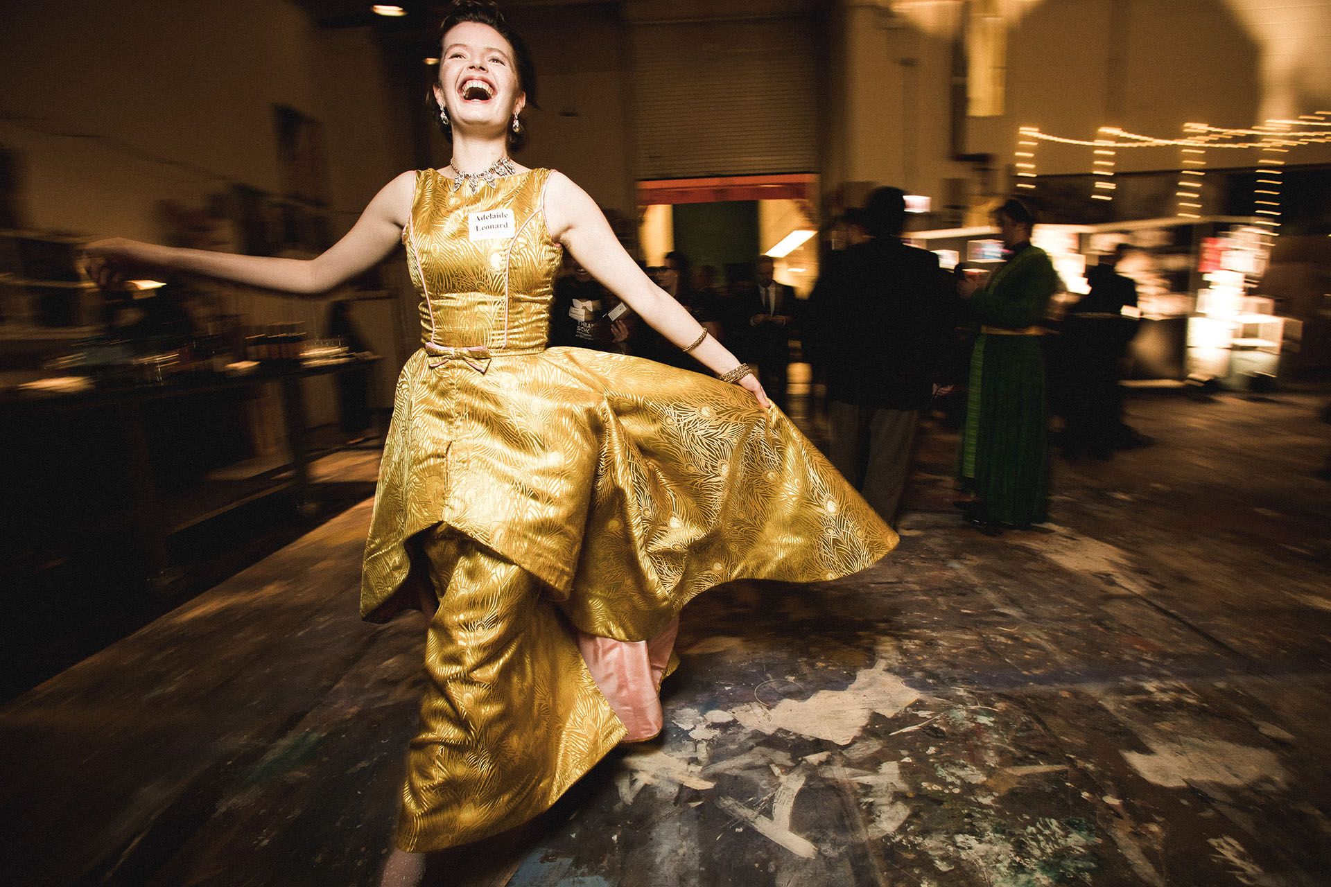 Second year BFA actor Adelaide Leonard models a costume during the cocktail reception.