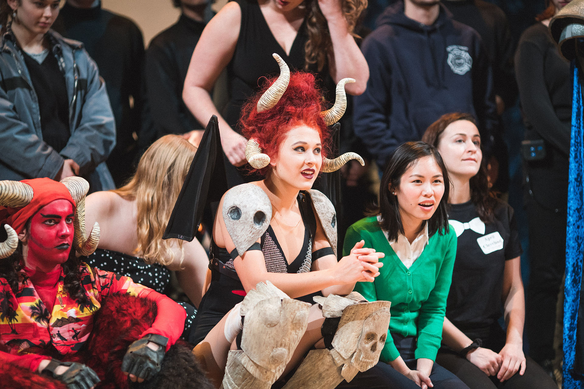 Students watch on stage as the auction heats up at the 2018 LIGHTS UP! event support student scholarships.
